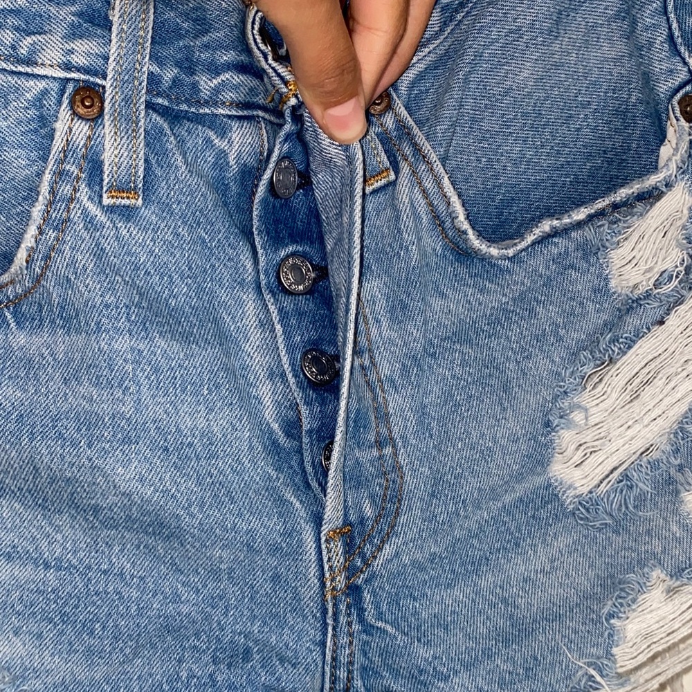 Levi's Distressed Light Blue Denim Cutoff Shorts - Picture 3 of 4